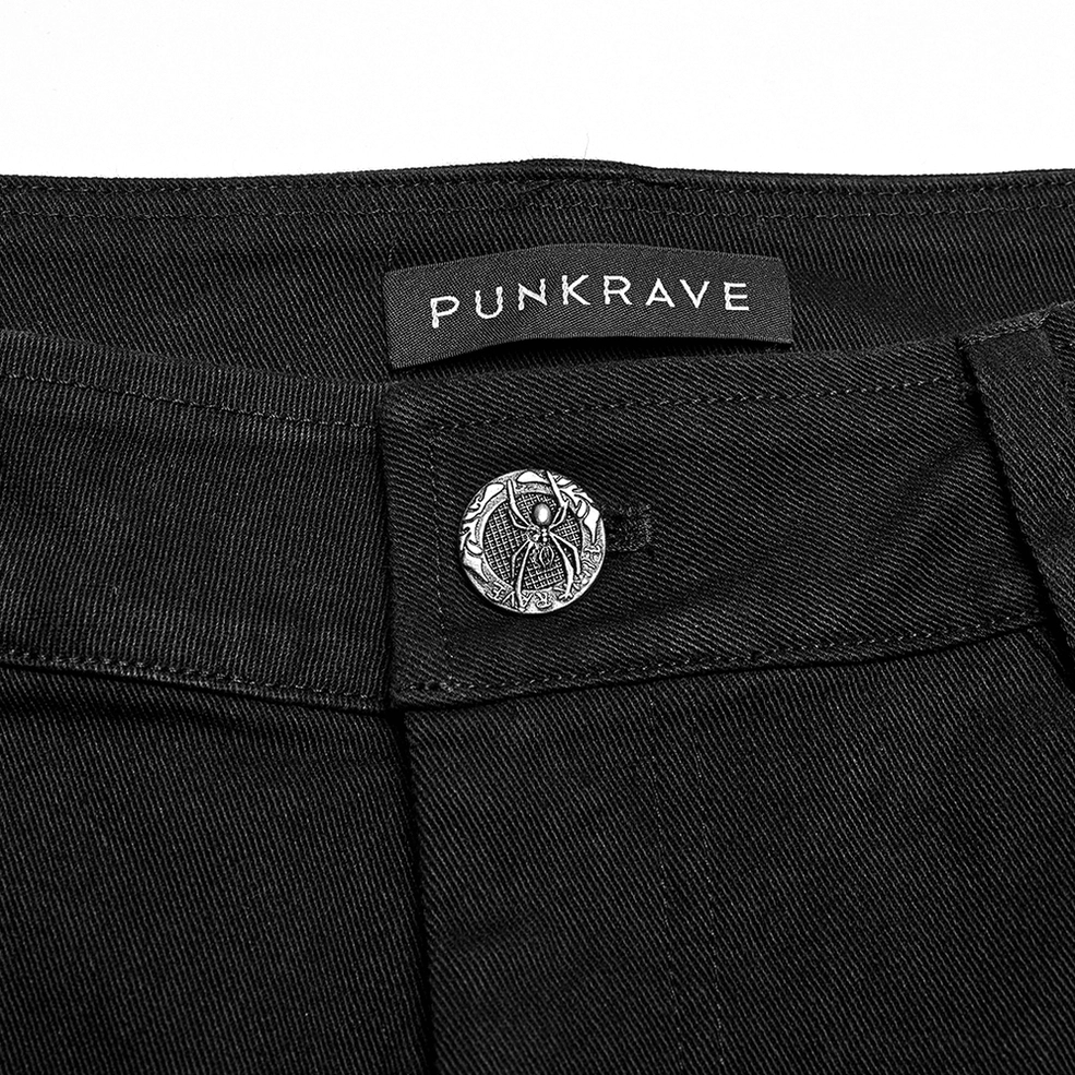 Waistband close-up showing metal spider-themed button and durable twill fabric construction