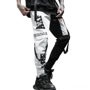Men's gothic black and white patchwork cargo pants front view with graphic prints and utility straps