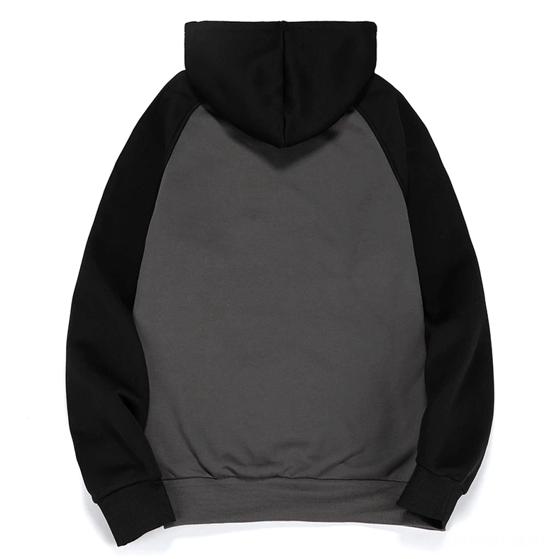 Yellow and black color-block hoodie flat lay displaying full patchwork construction