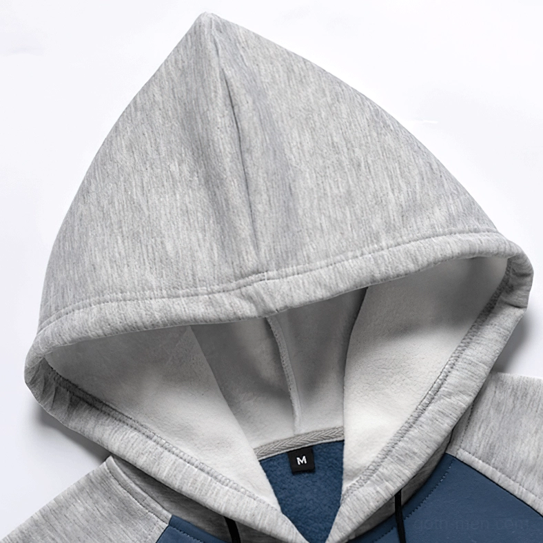 Patchwork color-block hoodie hem and length details on alternative fashion piece