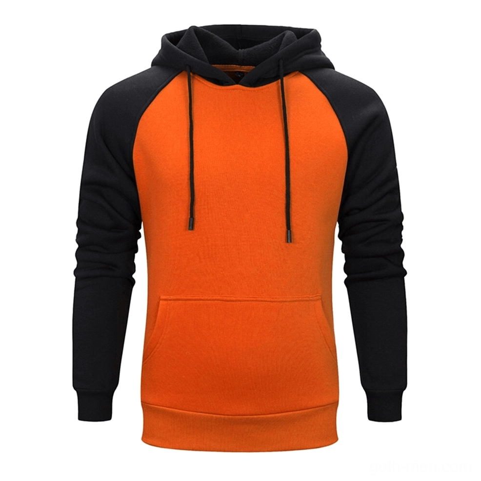 Orange and black patchwork fleece hoodie with raglan sleeves and alternative fashion appeal