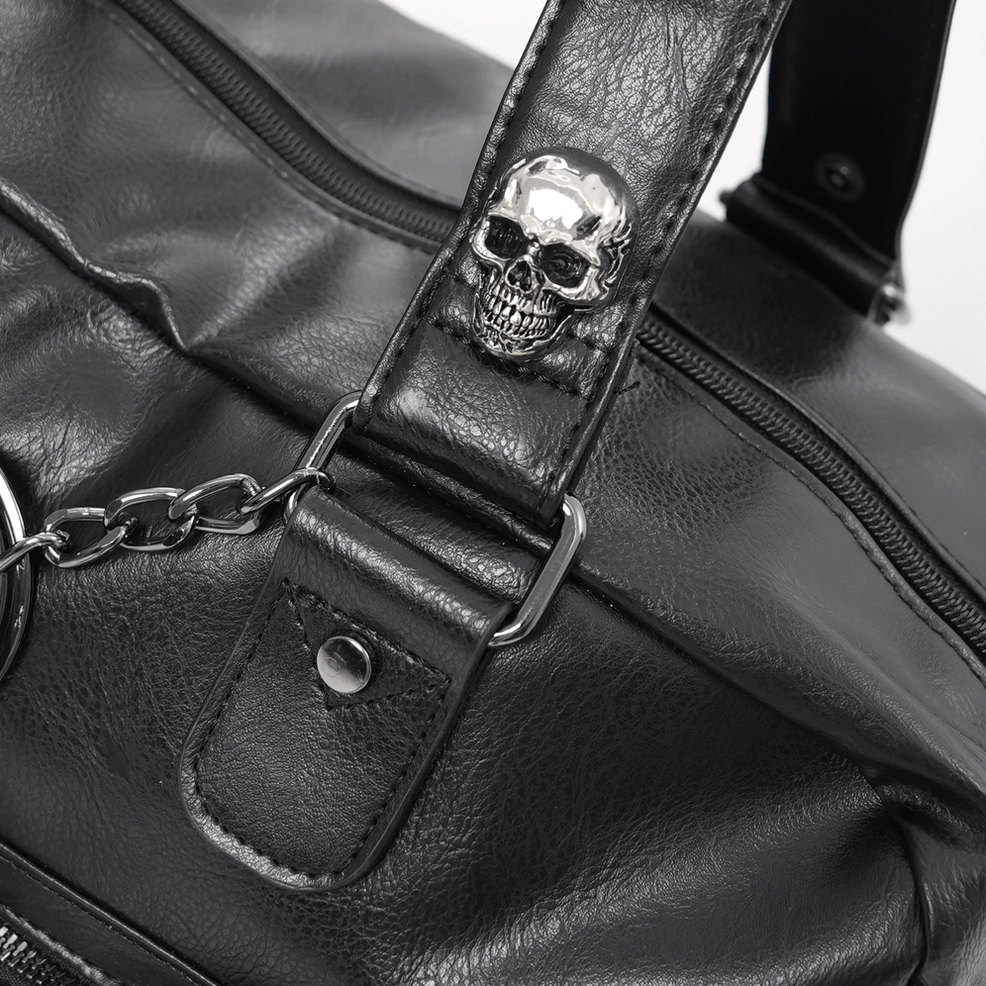 Black pentagram chain gothic leather tote bag showing main compartment capacity and interior organization pockets