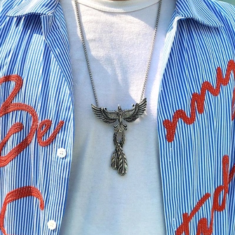 Gothic phoenix pendant necklace with alternative chain style, stainless steel winged design detail shot