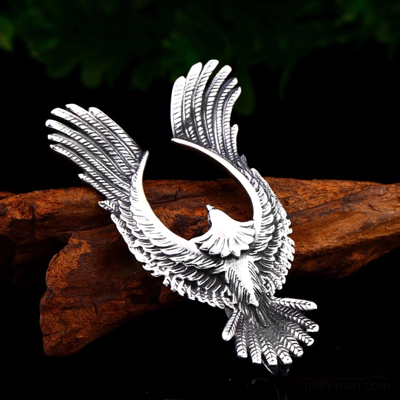 Detailed side view of gothic phoenix pendant showing hollow carved feather texture and vintage silver finish