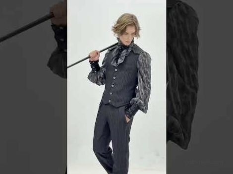 Styled gothic outfit featuring black pinstriped trousers with ruffled victorian shirt and waistcoat ensemble