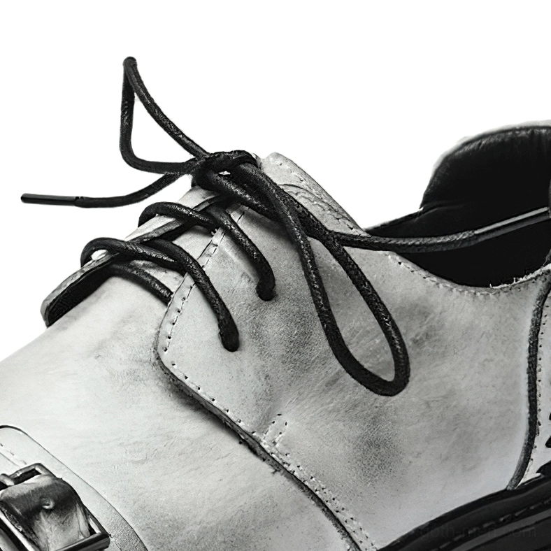 Brown leather gothic work platform boots three-quarter front view with industrial buckle detail