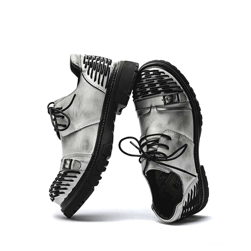 Gray distressed leather gothic platform boots side view with metal buckle and woven toe cap