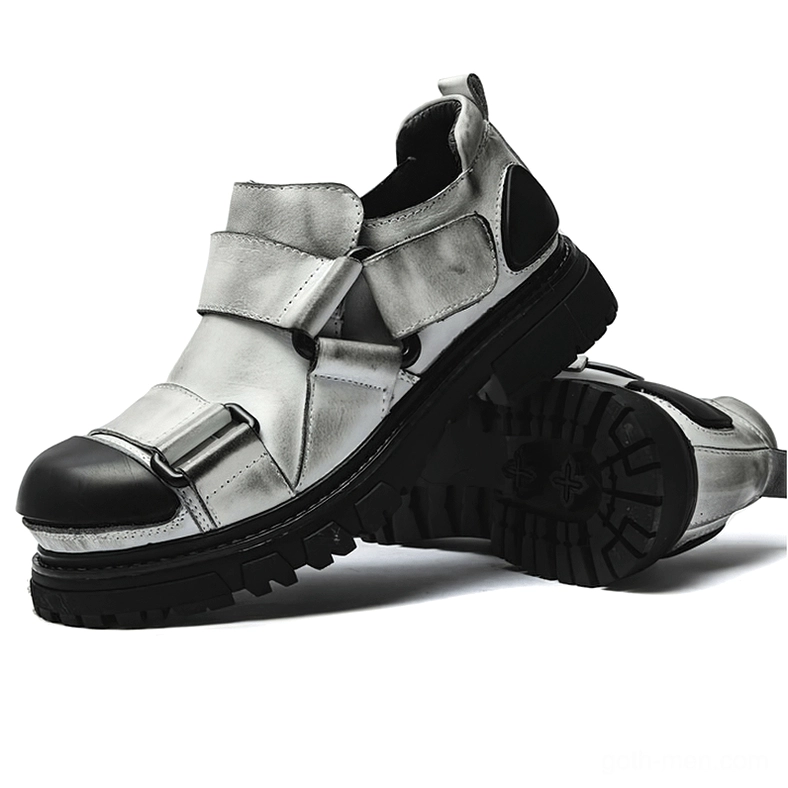 Distressed gray and black gothic platform loafers with velcro straps and thick lug rubber sole, three-quarter side view and sole display