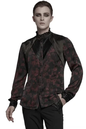 Men's black gothic shirt with pleated stand collar, wine-red damask floral print, leather shoulder trim and skull buttons - front three-quarter view on model
