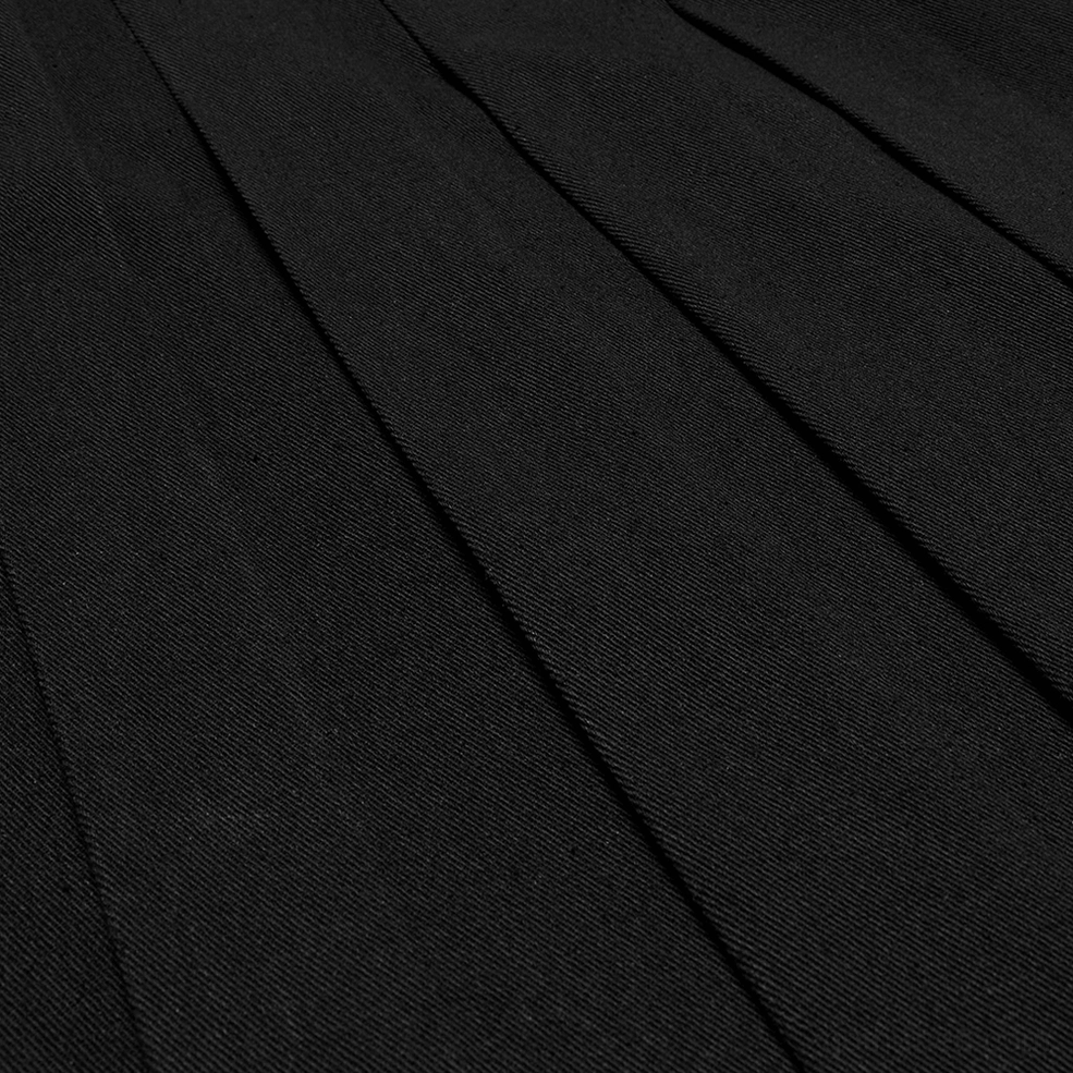 Black gothic pleated half skirt full product shot showing structured silhouette and decorative elements