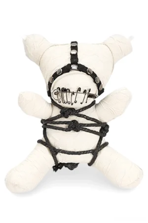 Gothic plush ornament with black bondage harness, metal studs, and safety pin mouth detail, front view