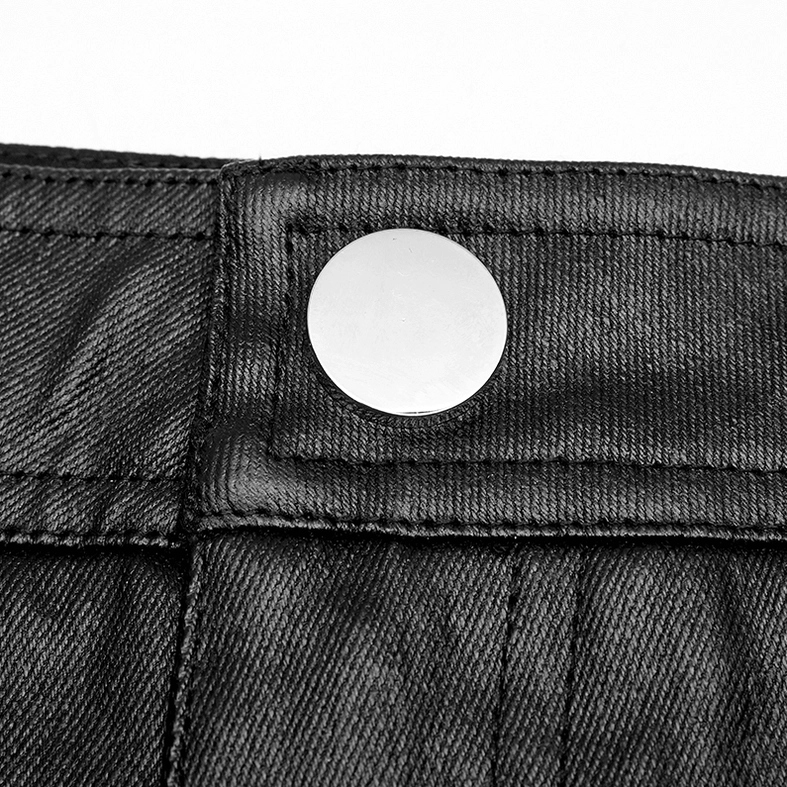 Close-up detail of black gothic pants metal button hardware and woven PU fabric texture