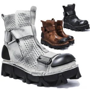 Multi-color gothic punk platform boots with perforated leather vamp, buckle straps, and distressed color blocking - front view
