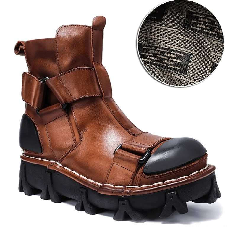 Gothic punk ankle boots construction detail with visible stitching reinforcement and buckle hardware assembly