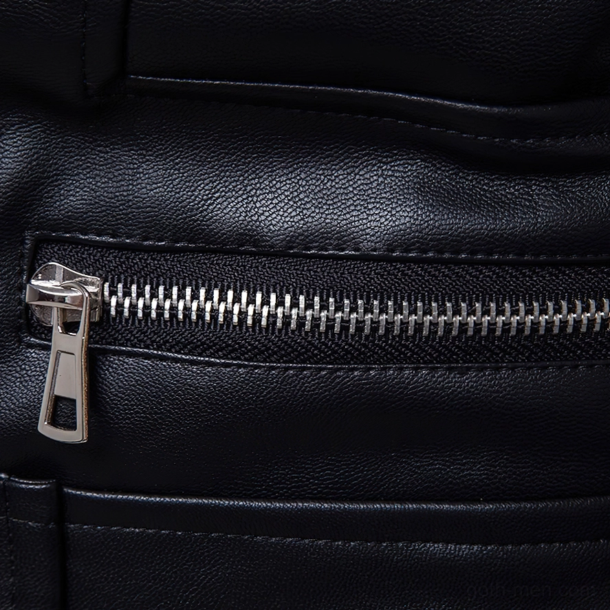 Front zipper pocket detail with silver metal hardware and precise seam stitching on gothic jacket