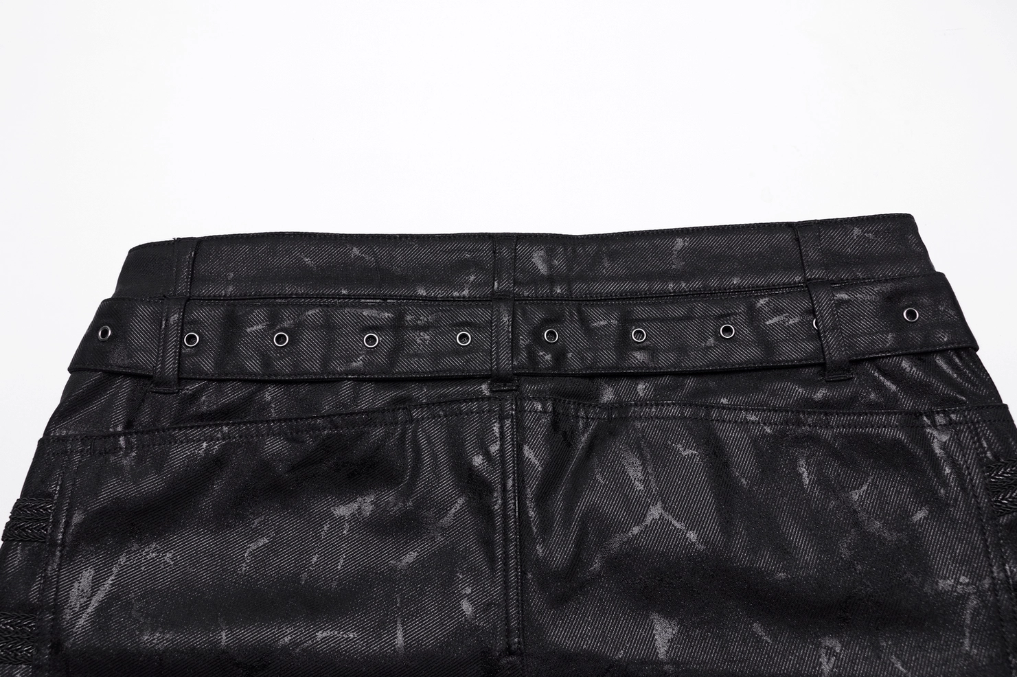 Gothic punk jeans rear waist closeup grommet belt loops leather overlay marbled