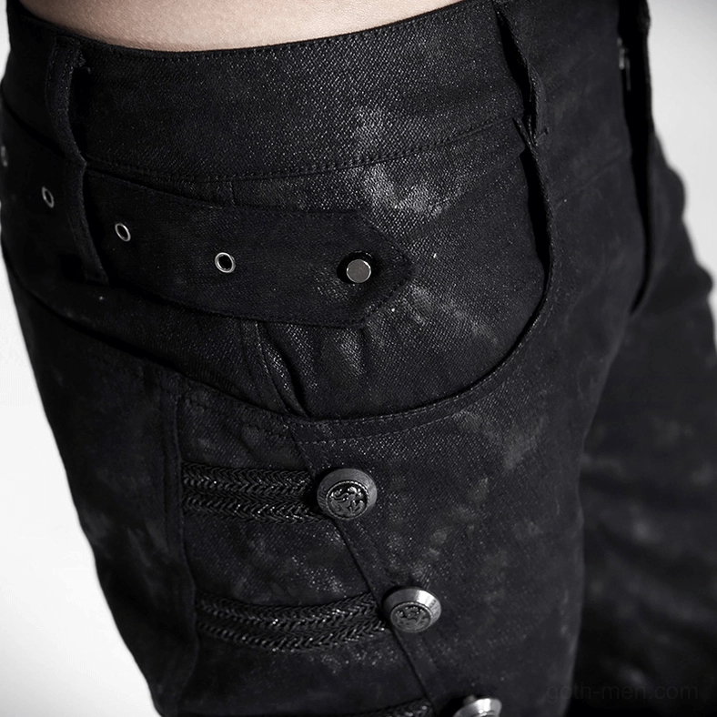 Black marbled gothic punk jeans texture detail rivet studding close-up view