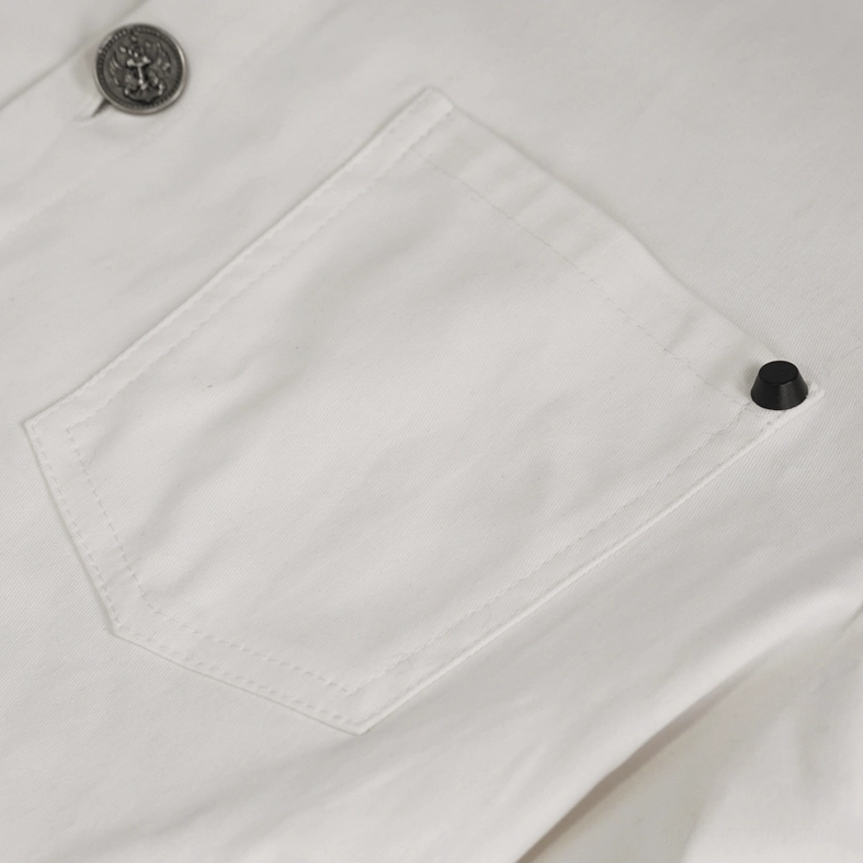 Detailed view of white gothic punk shirt chest pocket with metal button and visible stitching on twill cotton fabric