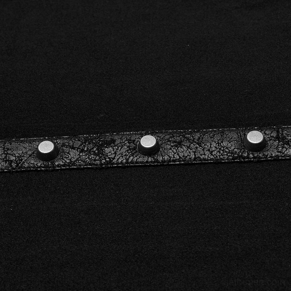 Close-up detail of cracked leather studded strap trim on gothic punk sleeveless shirt with metal studs