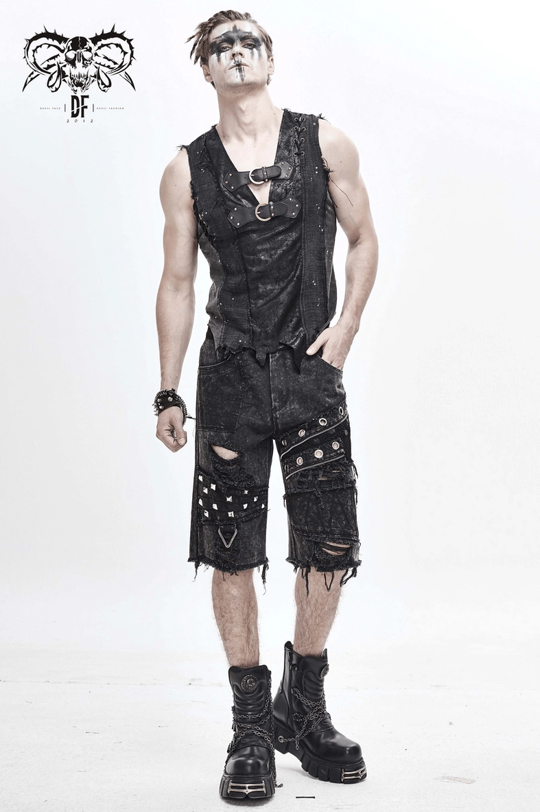 Detail of black gothic punk shorts highlighting metal accents frayed hem and distressed design craftsmanship