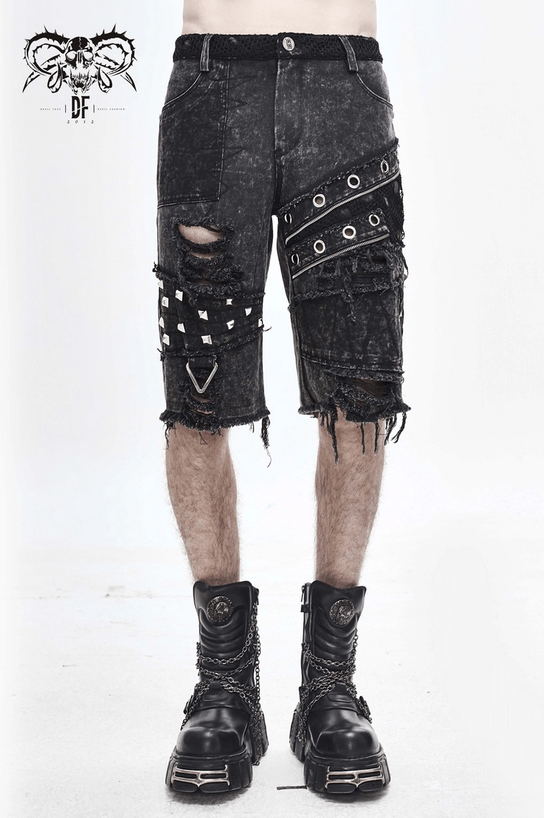 Gothic punk shorts detailed view of ripped sections metal rivets frayed edges and decorative eyelet placement