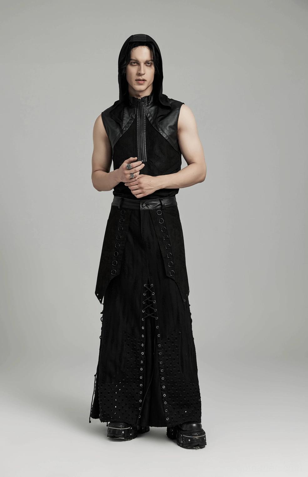 Black gothic punk maxi skirt showing irregular hem splicing and multi-layer construction texture