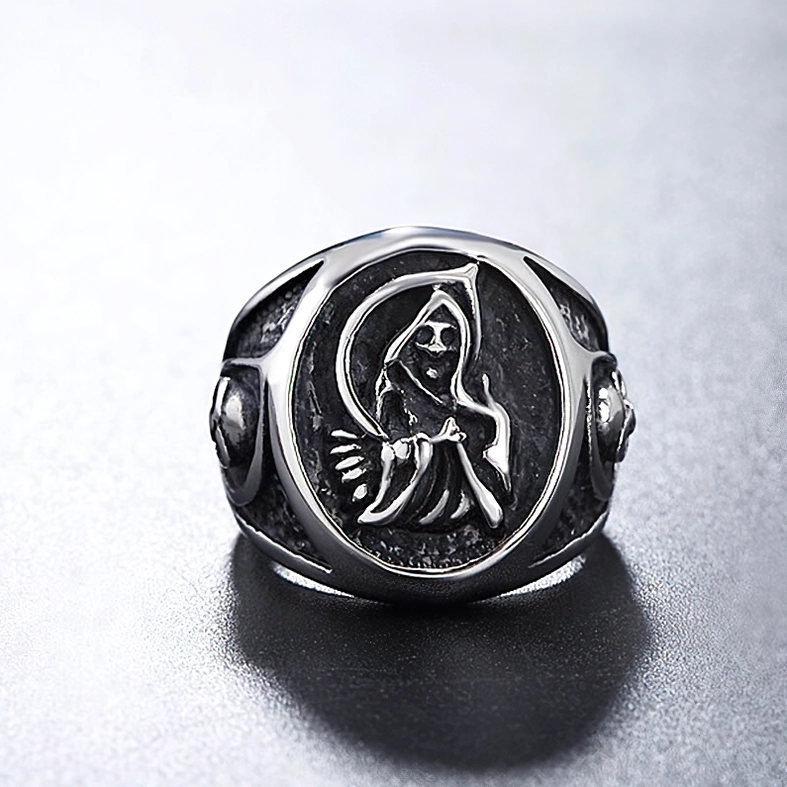 Hammered texture gothic ring top view showing dimensional reaper carving and surface detail work