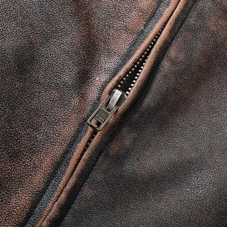 Vintage brown leather motorcycle jacket styling view emphasizing gothic rebel aesthetic and slim fit silhouette