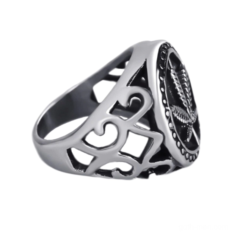 Gothic signet ring rear view displaying hollow scrollwork band and vintage metal craftsmanship
