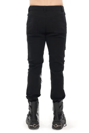 Gothic black distressed pants rear full body view showing ripped leg details worn with platform boots