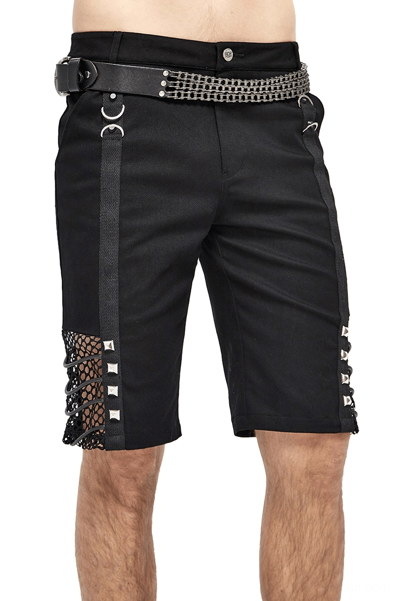 Men's black gothic rivet mesh shorts front view with fishnet panels and pyramid rivets