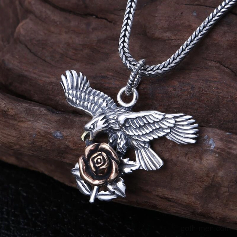 Right side angle of gothic rose eagle necklace pendant with braided silver chain detail and two-tone vintage finish