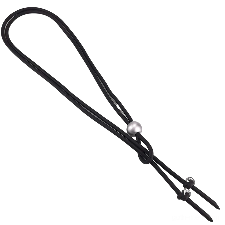 Adjustable black rubber rope necklace with silver pearl bead and metal fasteners, side flat lay perspective