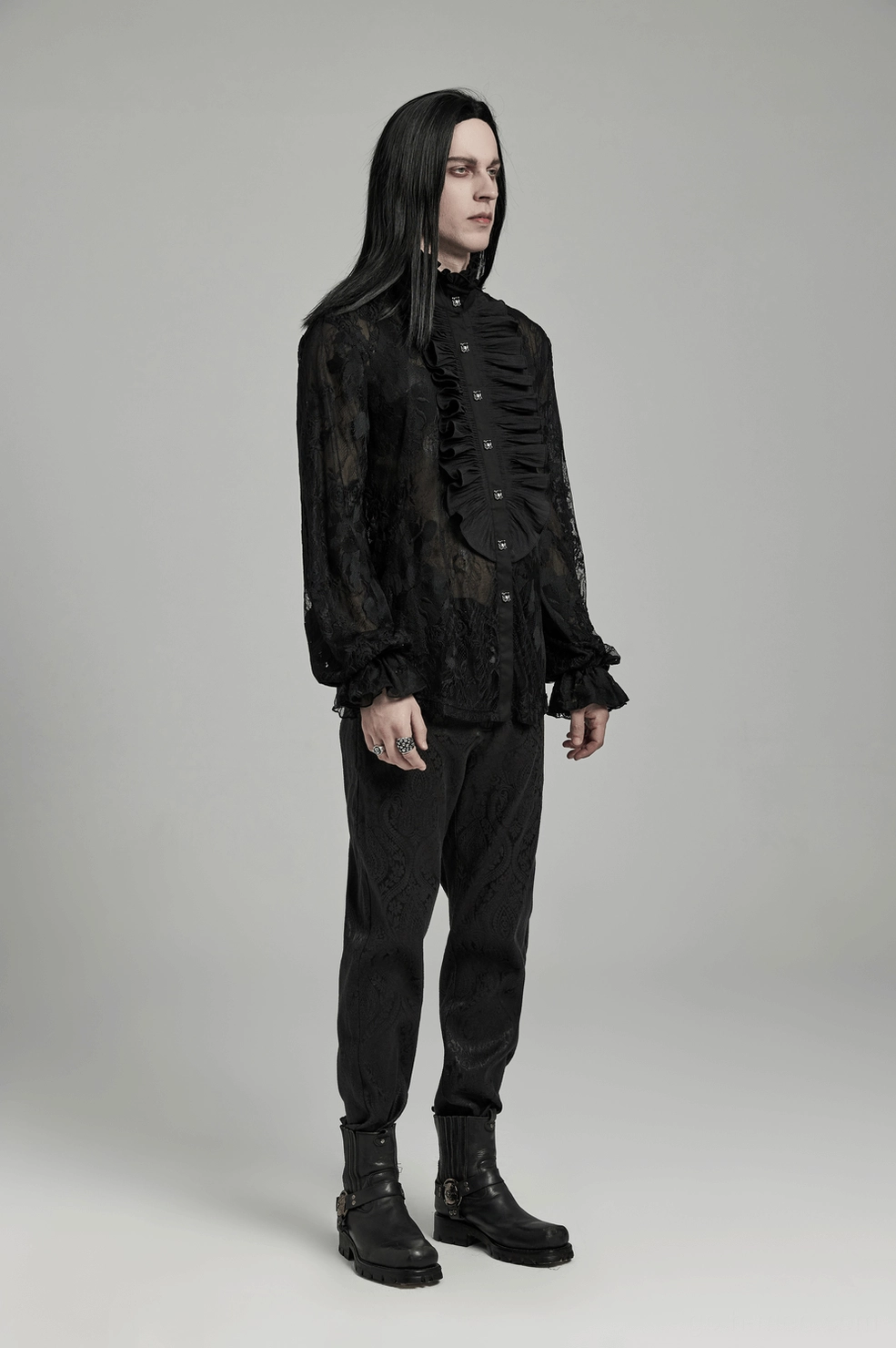 Alternative angle of black gothic lace ruffled shirt showing dimensional ruffle construction and lace transparency