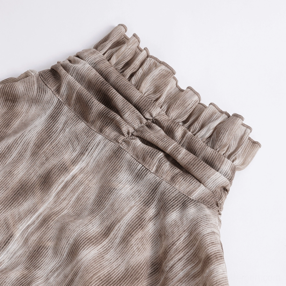 Side close-up of gothic shirt stacked ruffled neckline with zigzag striped fabric gathered texture