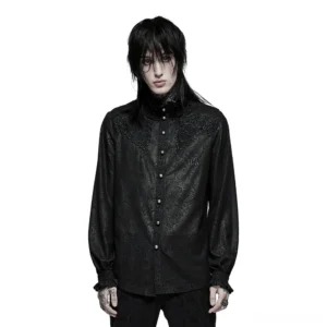 Black ruffled gothic shirt with lace chest applique and paisley printed sleeves worn by male model, front view showcasing ornate collar detail
