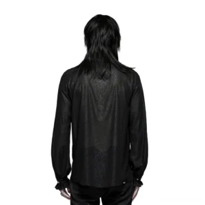 Back view of black gothic ruffled shirt displaying paisley textile print and bloused sleeve silhouette on male model