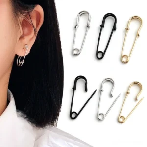 Gothic safety pin stud earrings in three finishes worn on model, silver gold and black punk rock metal earrings