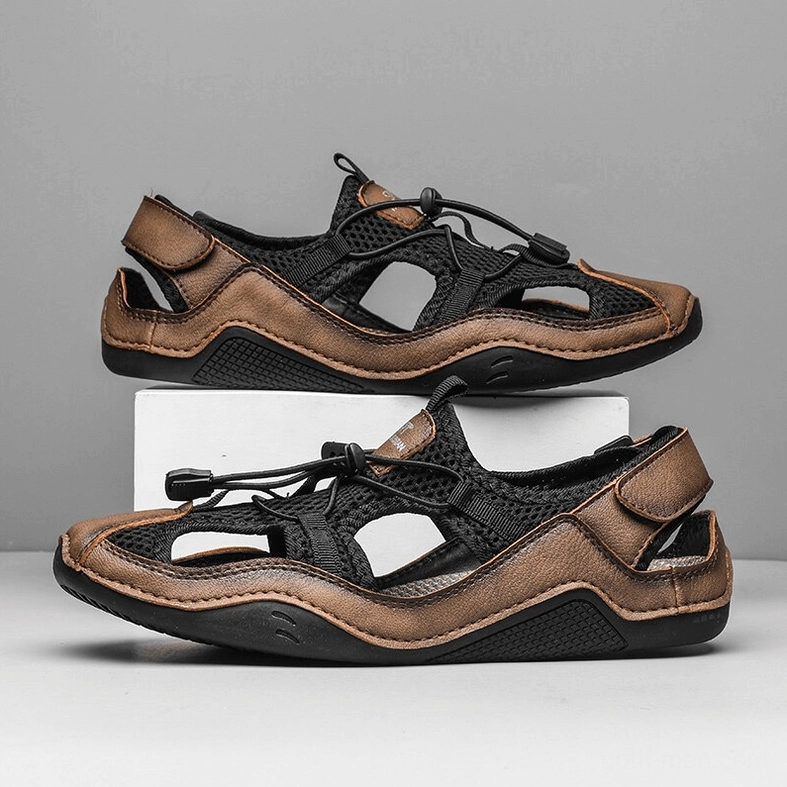 Gothic leather sandal bottom view showing non-slip rubber outsole grip pattern for safety