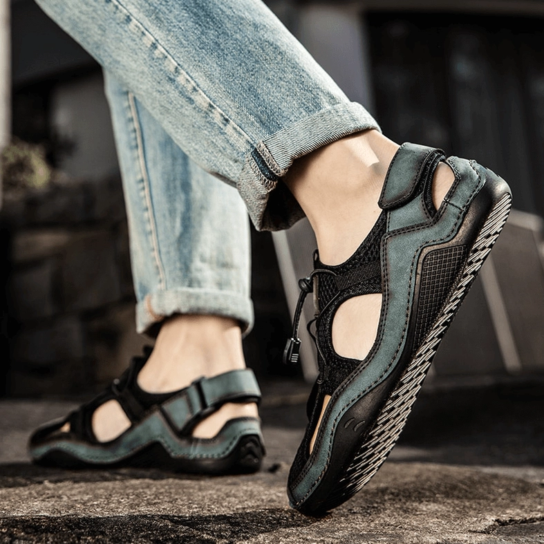 Gothic leather sandal showing reinforced toe cap design and split leather upper material quality