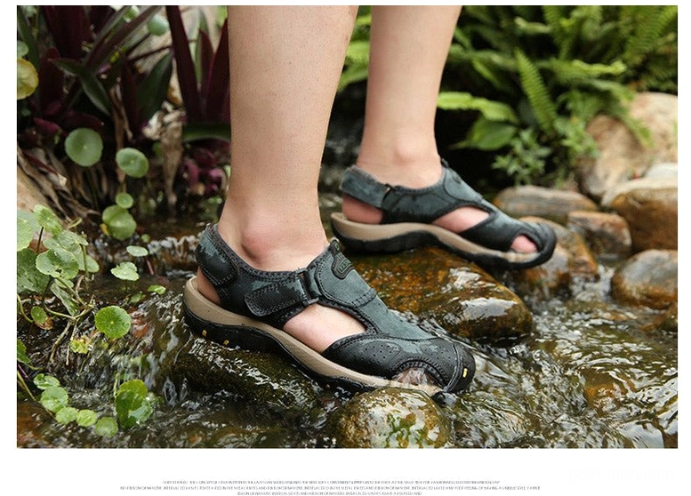 Structured strap design on gothic sandals showing geometric precision and engineering