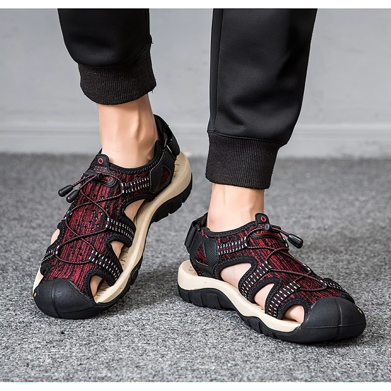 Wine-red gothic gladiator sandals worn on feet casual wearing style indoor grey floor