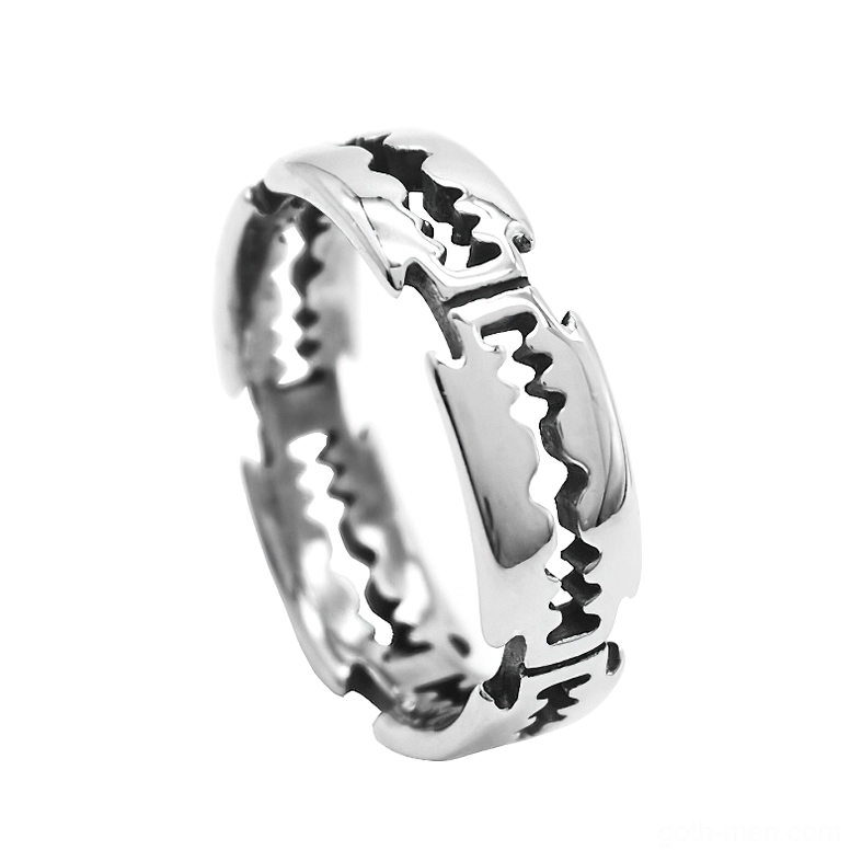 Gothic sawtooth blade ring with polished silver finish - oblique side view showcasing sharp angular geometry