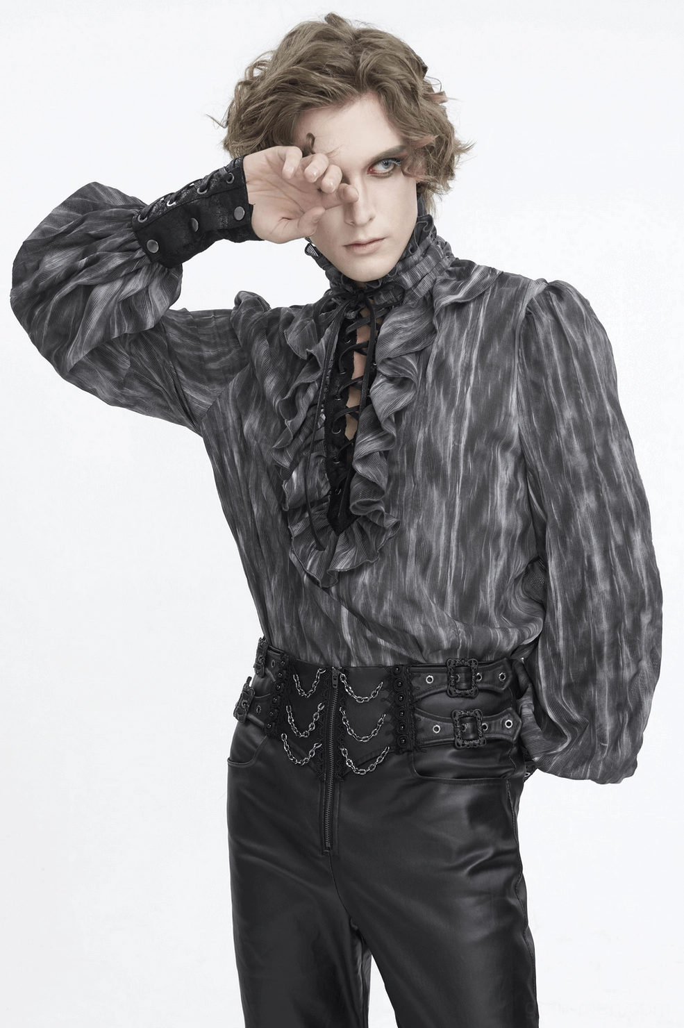 Angled view of charcoal gothic lace-up ruffle shirt on mannequin showing collar volume and sleeve design details