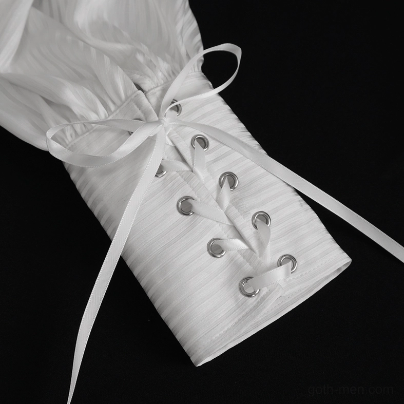 Close-up detail of white gothic dress shirt adjustable bishop sleeve cuff with lace-up ribbon ties and metal eyelets