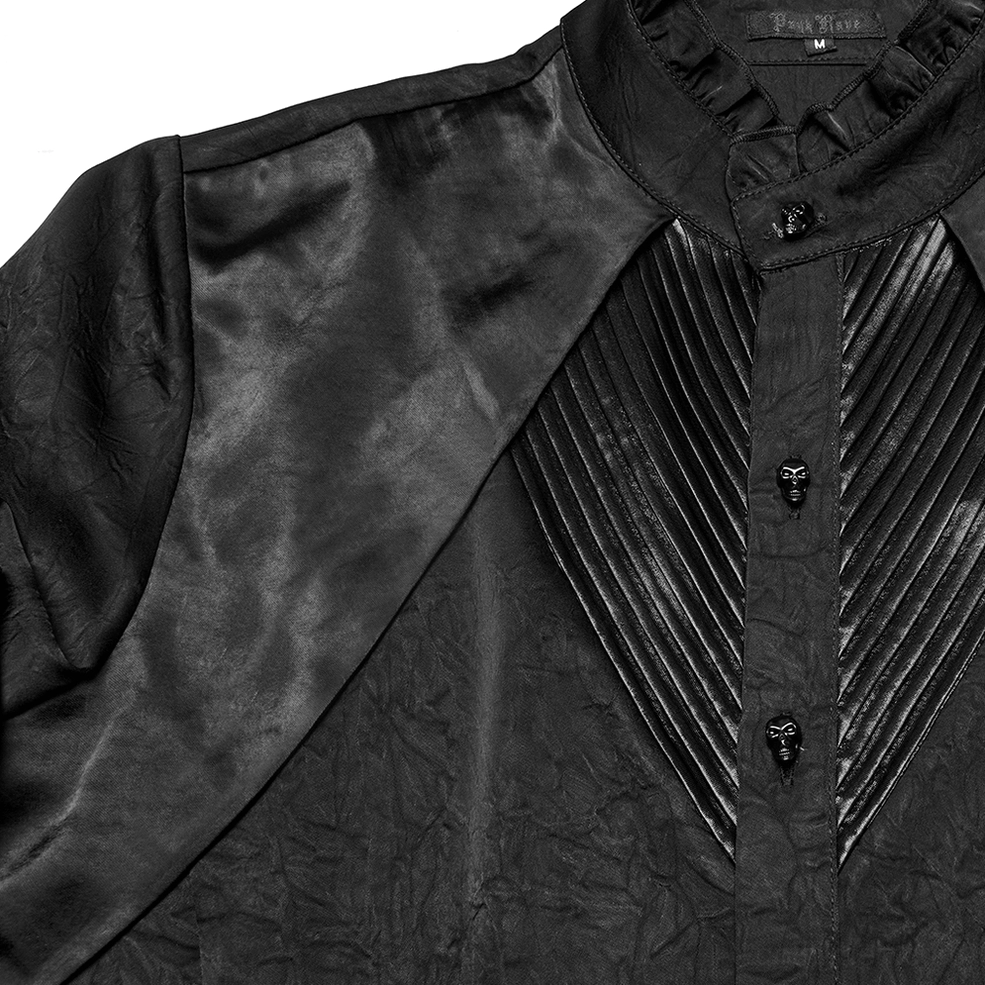 Pleated chest panel close-up showing glossy satin finish and skull front button fasteners