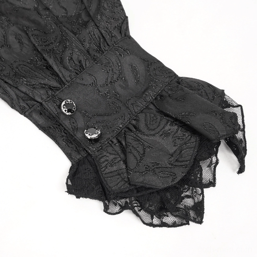 Side close-up detail of jacquard fabric and metal buttons with black lace underlayer on gothic shirt cuff