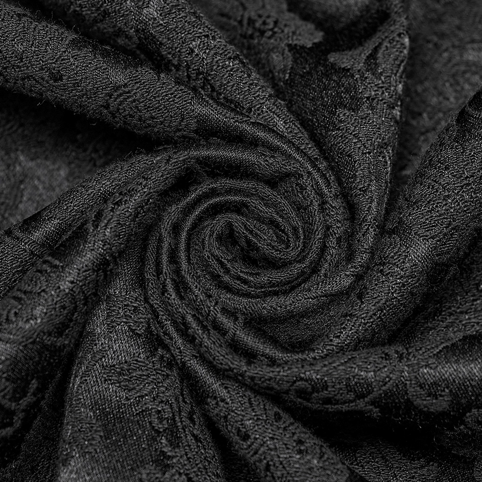 Fabric construction detail of gothic jacquard shirt showing jacquard weave pattern and mesh overlay