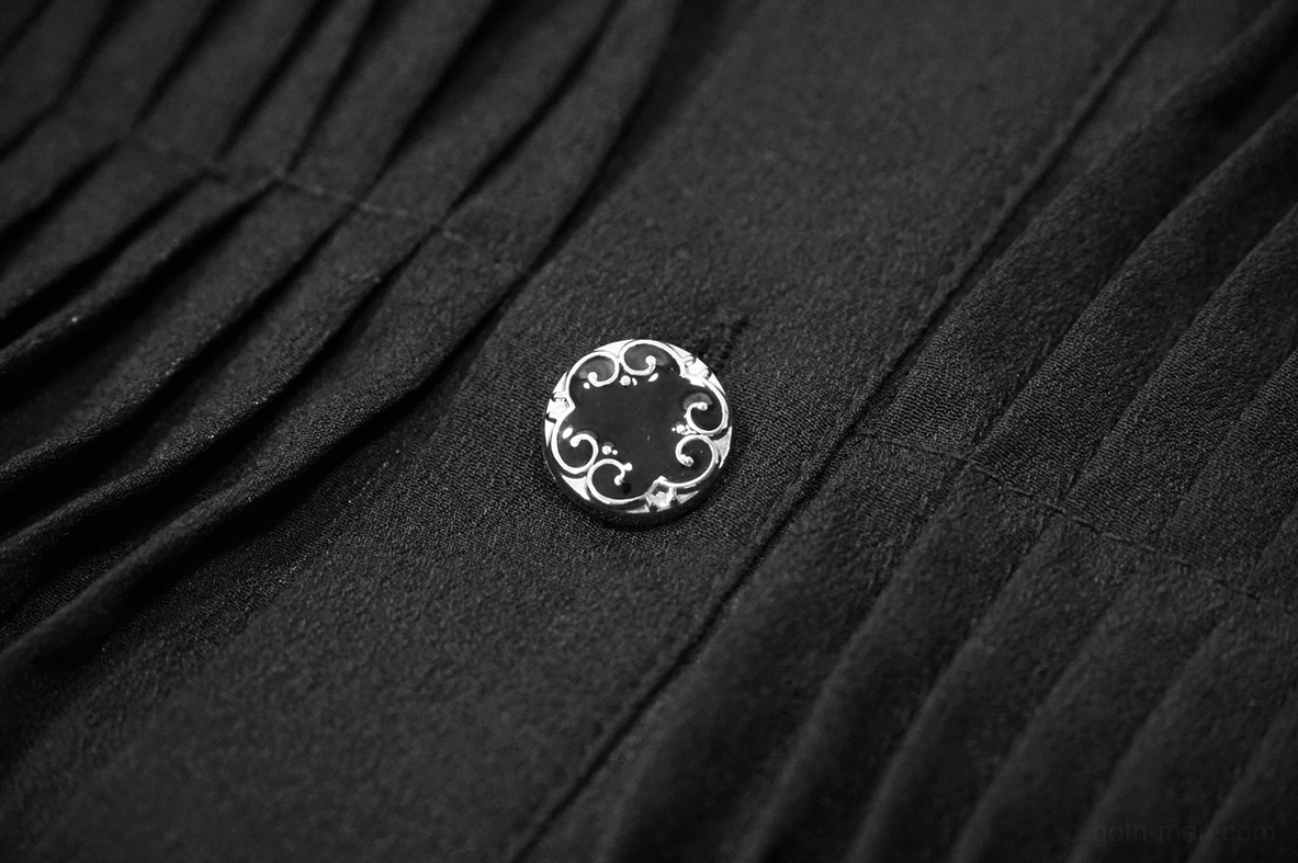 Macro close-up of gothic shirt smooth woven fabric texture with ornate metal button detail