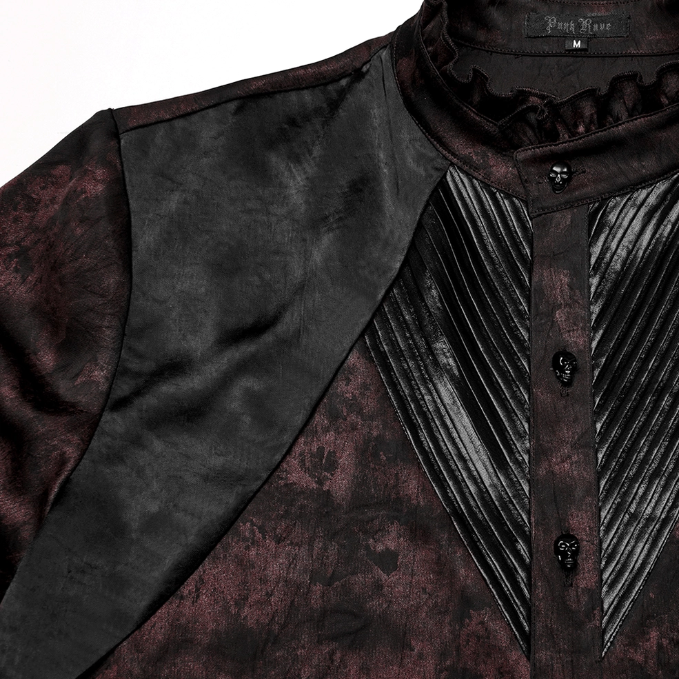 Close-up side-front view of gothic shirt front placket featuring pleated leather trim accent, skull buttons, dark floral base fabric, and construction seaming
